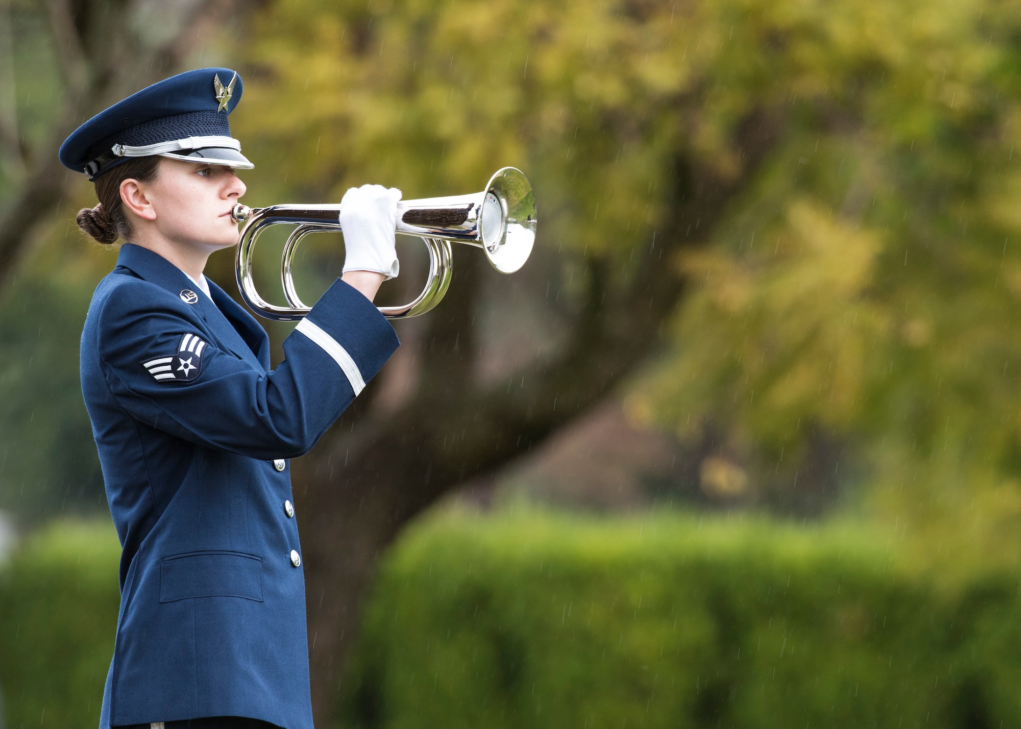 Senior Airman Daniella Boni, Vandenberg Honor Guard ceremonial guardsmen, plays taps with the bugle during a U.S. Air Force active duty funeral March 2, 2019, in Camarillo, Calif. Taps is a bugle call played at dusk on military installations, during flag ceremonies and at military funerals by the United States Armed Forces. Taps replaced the formal Lights Out in 1862 when Union General Daniel Adams Butterfield dedicated the song to honor 600 men who were killed in battle. (U.S. Air Force photo by Airman 1st Class Aubree Milks)