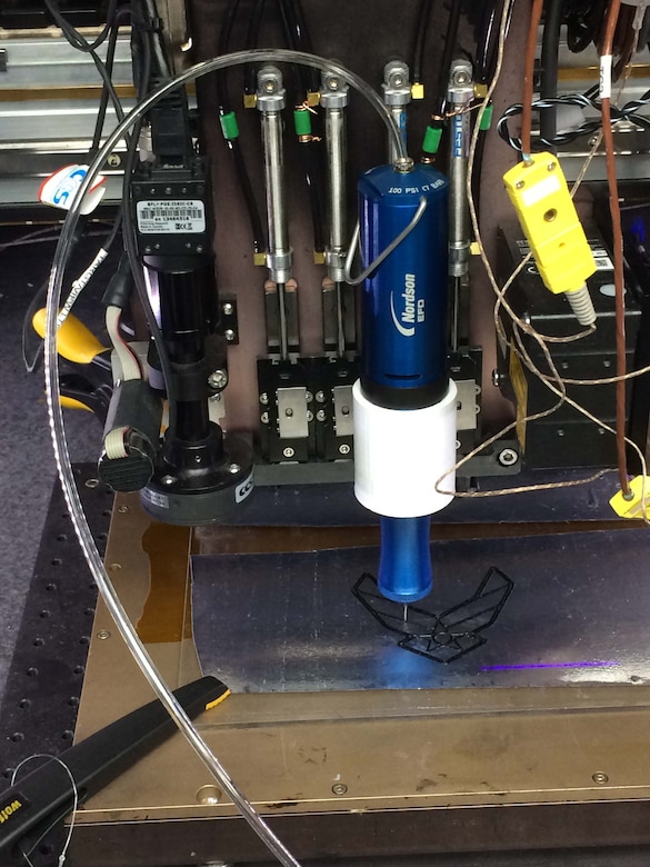 Direct ink printing is performed with a 3D printer using epoxy with chopped fiber. The pressure pump provides pressure to force the resin through the nozzle. (Courtesy photo)