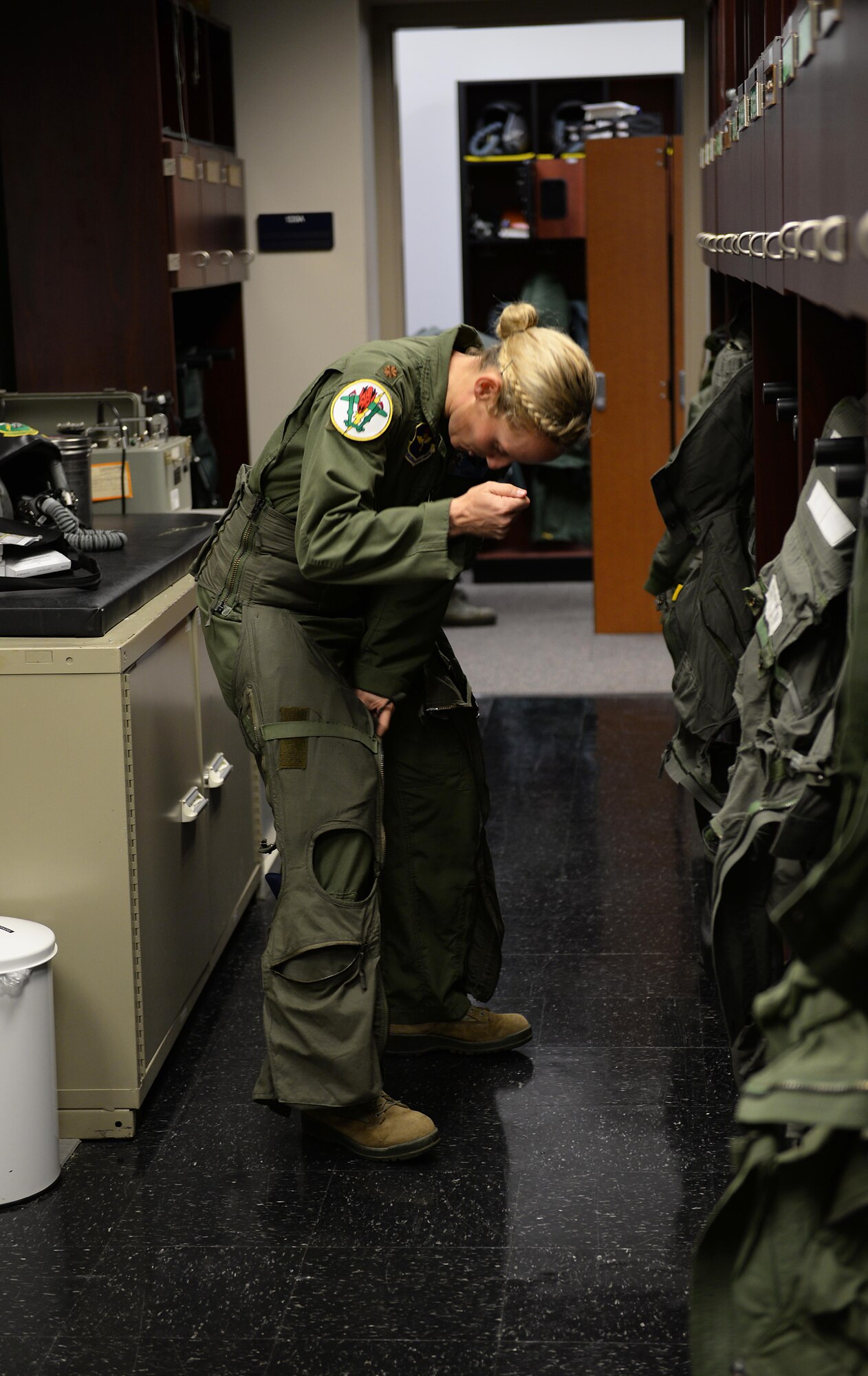 Maj. Andrea Matesick, 49th Fight Training Squadron weapons system officer, tightens her G-suit before a training sortie March 7, 2019, on Columbus Air Force Base, Mississippi. Introduction to Fighter Fundamentals builds upon the training learned in Specialized Undergraduate Pilot Training with a major focus on the fundamentals, or basics, of tactical aviation. (U.S. Air Force photo by Airman Hannah Bean)