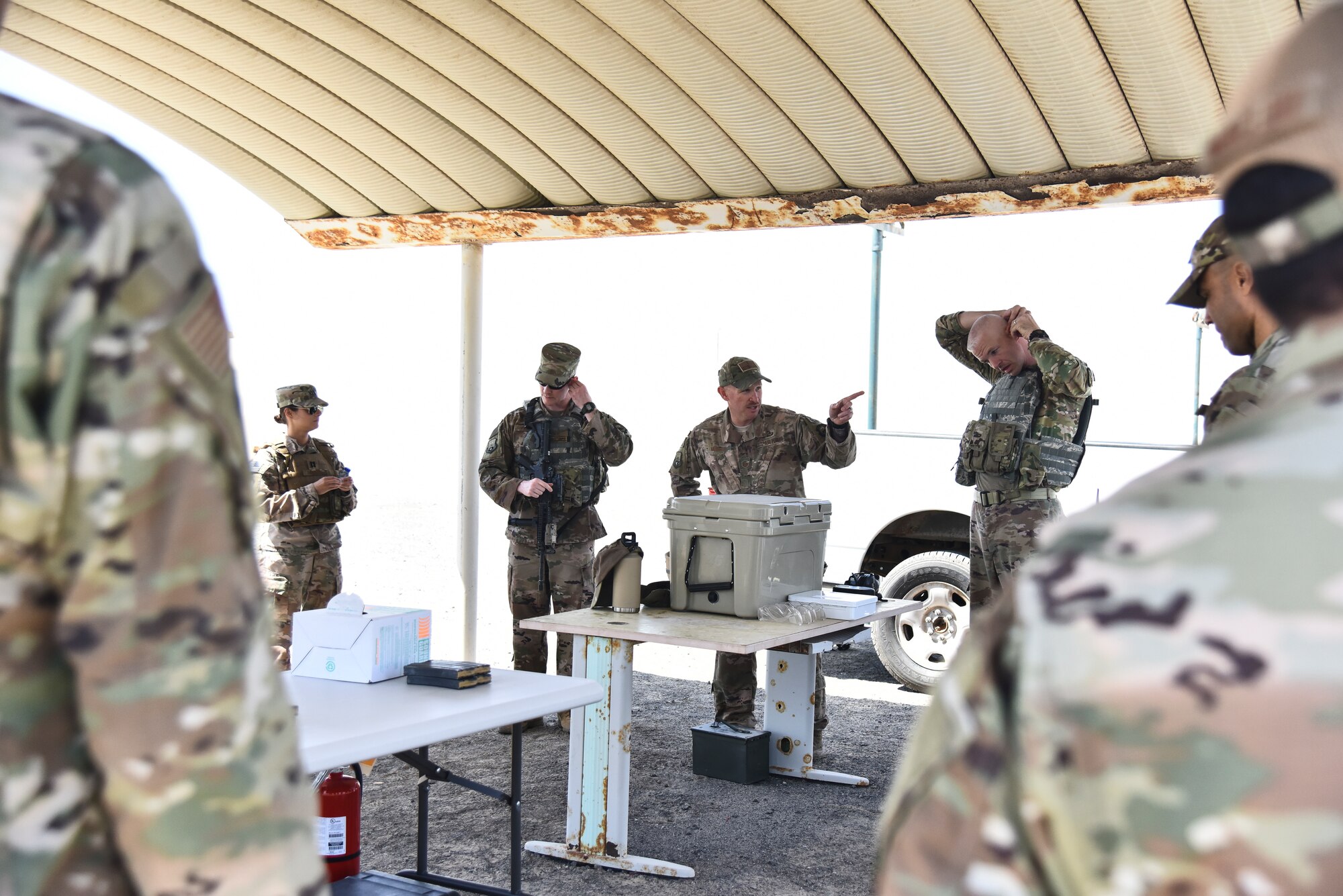 Master Sgt. Kurt Musson, 380th Expeditionary Security Forces Squadron NCO in charge of combat arms, gives 380th ESFS Airmen a safety briefing at Al Dhafra Air Base, United Arab Emirates, March 8, 2019. As the largest career field in the Air Force, it’s the job of Security Forces to protect, defend and fight to enable U.S. Air Force, Joint and Coalition missions. (U.S. Air Force photo by Senior Airman Mya M. Crosby)