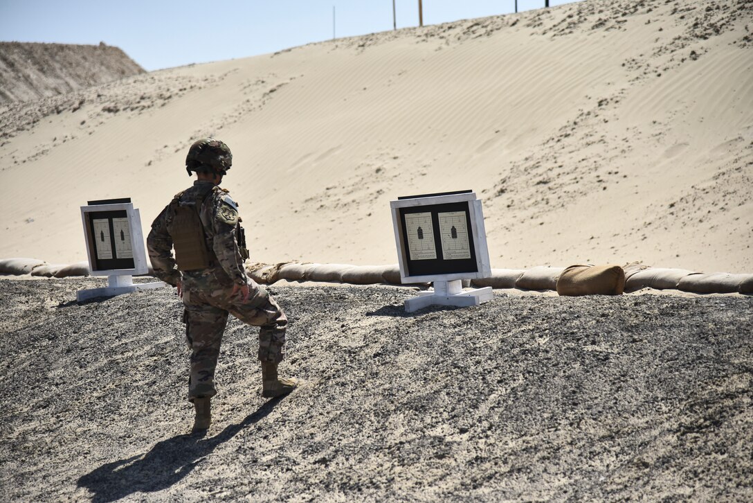 Capt. Jaclyn Bergstein, 380th Expeditionary Security Forces Squadron director of operations, observes her sight corrections at Al Dhafra Air Base, United Arab Emirates, March 8, 2019. Security Forces members have been entrusted with the protection of personnel and resources and, as such, will not leave nor abandon any post. (U.S. Air Force photo by Senior Airman Mya M. Crosby)