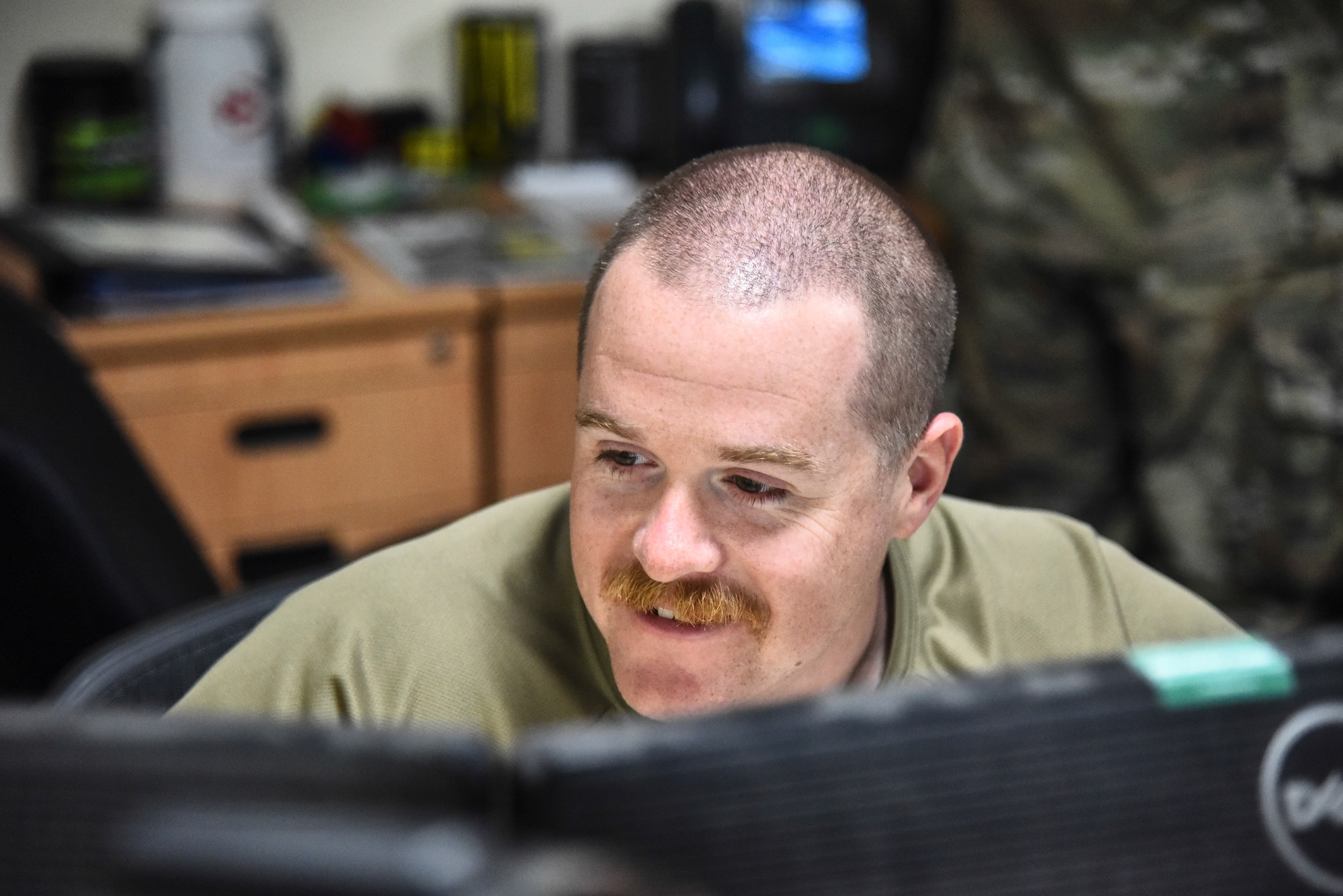 Staff Sgt. Jeremy Shiflett, 380th Expeditionary Maintenance Group KC-10 Extender quality assurance inspector, reviews a written evaluation at Al Dhafra Air Base, United Arab Emirates, March 12, 2019. QA shops consists of Airmen from different maintenance backgrounds such as crew chiefs and avionics specialists. (U.S. Air Force photo by Senior Airman Mya M. Crosby)