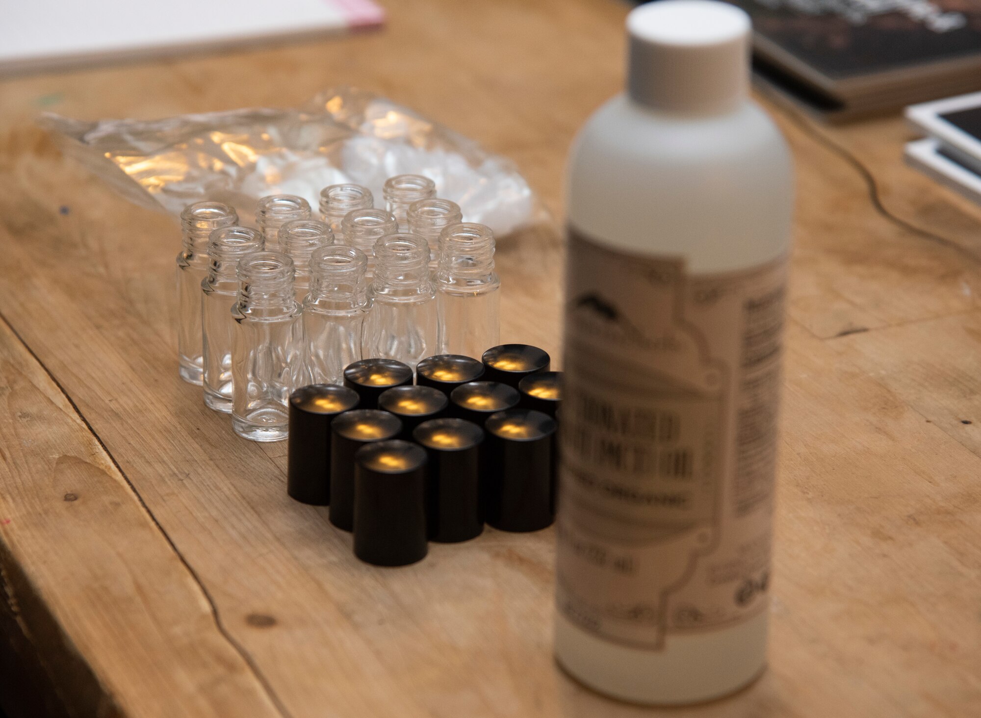 Items to make essential oil rollers sits on a table during an essential oils class at Misawa Air Base, Japan, March 12, 2019. The class offered education on three different oils—lavender, lemon and peppermint—and their uses. Community members met new people and socialized, building on their Comprehensive Airman Fitness pillars. (U.S. Air Force photo by Senior Airman Sadie Colbert)