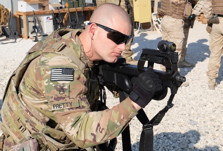 Staff Sergeant (P) Andrew Pretty trains on the FN P90 compact weapon.