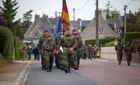 German Luftlandebrigade 1(LLB1) participate in a joint ceremony with U.S. Soldiers in Picauville, France