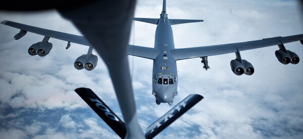 A U.S. Air Force B-52 Stratofortress approaches a KC-135 Stratotanker from the 100th Air Refueling Wing, RAF Mildenhall, England, before receiving fuel above the English coast, March 14, 2019.  The U.S. routinely and visibly demonstrates commitment to allies and partners through the global employment of our military forces.