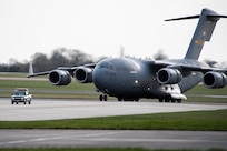 A C-17 Globemaster III from Charleston Air Force Base, S.C., taxis down the flight line at RAF Fairford, England, March 9, 2019. Multiple C-17s were required to deliver all the support equipment needed to support the U.S. Strategic Command Bomber Task Force (BTF) in Europe. (U.S. Air Force photo by Airman 1st Class Tessa B. Corrick)