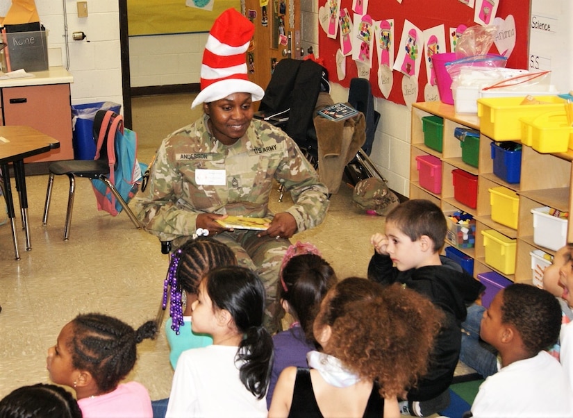 80th Training Command (TASS) U.S. Army Reserve Soldiers and Civilians enjoyed reading to Hopkins Road Elementary School children, celebrating National Read Across America Day, in honor of Dr. Seuss' birthday. Hopkins Elementary Reading Specialist Mrs. Christy Smith said that inviting the Soldiers to the school means a lot, not only to the kids, but to the parents and teachers as well. “Our kids look up to the Soldiers and see them as role models, and we absolutely love that,” said Smith.