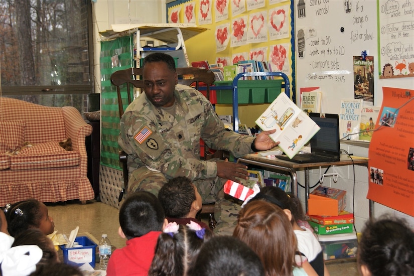 80th Training Command (TASS) U.S. Army Reserve Soldiers and Civilians enjoyed reading to Hopkins Road Elementary School children, celebrating National Read Across America Day, in honor of Dr. Seuss' birthday. Hopkins Elementary Reading Specialist Mrs. Christy Smith said that inviting the Soldiers to the school means a lot, not only to the kids, but to the parents and teachers as well. “Our kids look up to the Soldiers and see them as role models, and we absolutely love that,” said Smith.