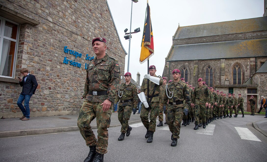 German Soldiers in a ceremony at Montebourg, France