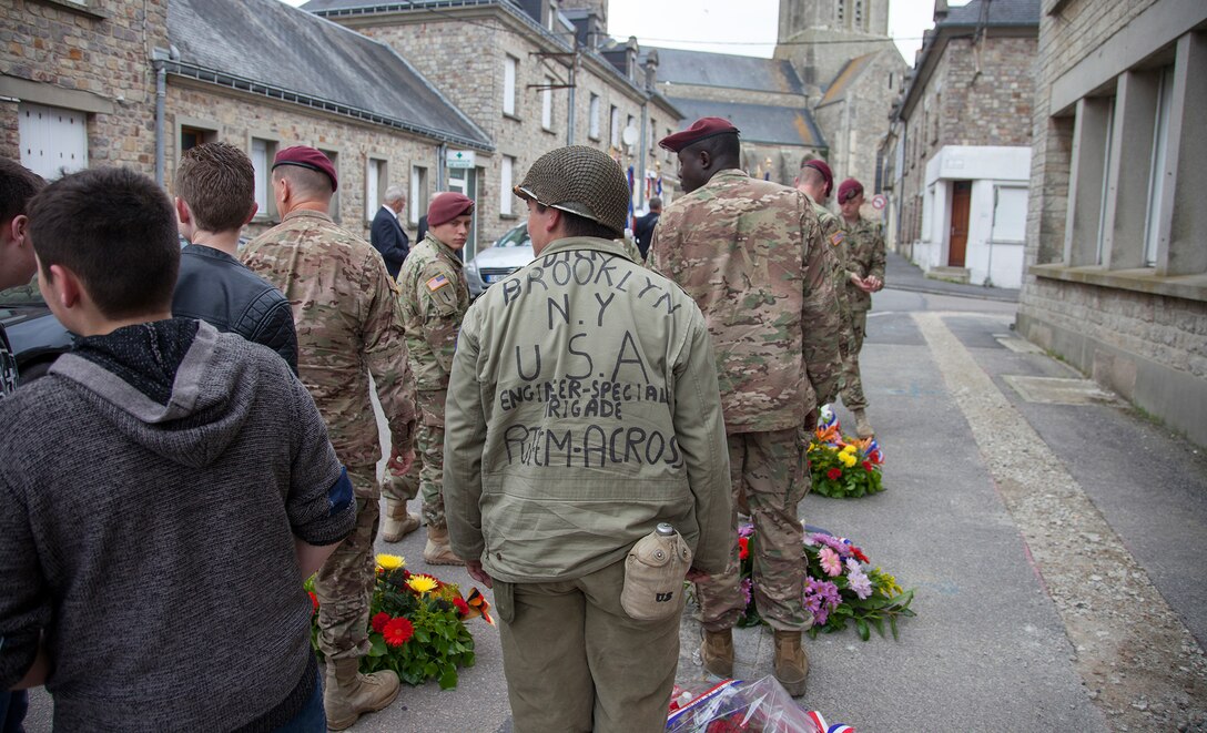 WWII reenactors, U.S. and German Soldiers in a ceremony at Montebourg, France