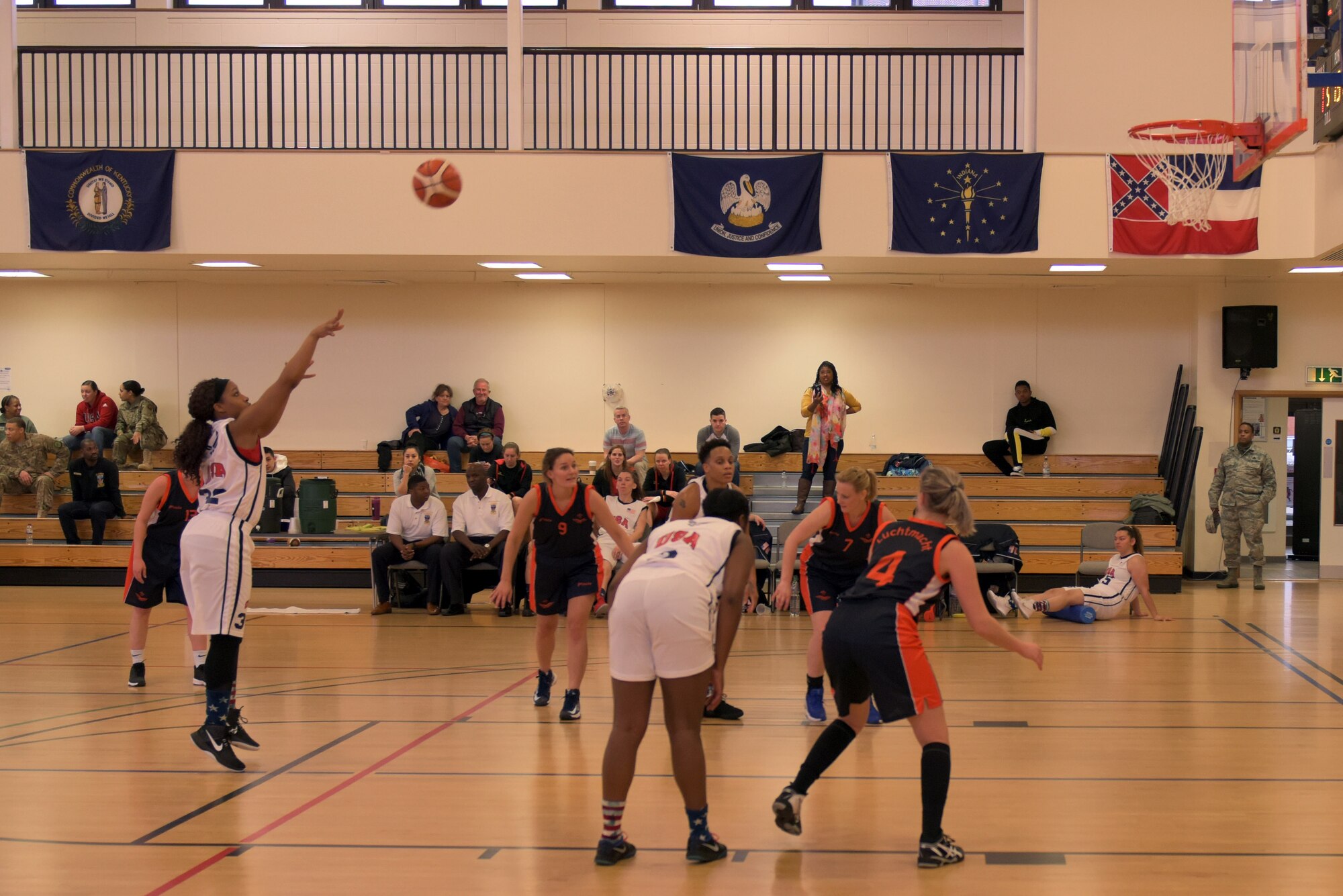 U.S. Air Force Staff Sgt. Simone Dotson shoots a free throw against the Royal Netherlands Air Force team at RAF Mildenhall, England, March 12, 2019. The aim of the Allied Air Command Sports Board mission is to encourage and assist the promotion of international sporting activities. (U.S. Air Force photo by Senior Airman Benjamin Cooper)