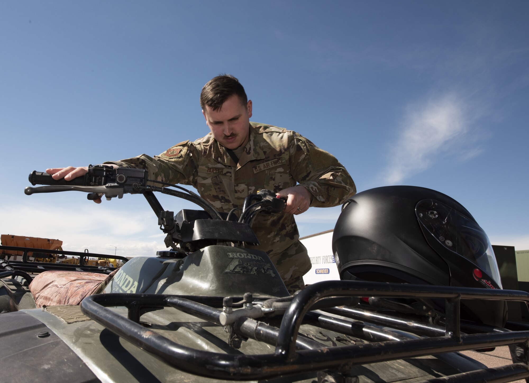 Senior Airman Austin Hopper, 50th Security Force Squadron resource and logistics, conducts a maintenance check on one of the 50th SFS perimeter all-terrain vehicles at the 50th Security Forces logistics facility at Schriever Air Force Base, Colorado, March 11, 2019. The logistics flight is responsible for providing and maintaining all vehicle assets belonging to the 50th SFS. (U.S. Air Force Photo by Staff Sgt. Matthew Coleman-Foster)