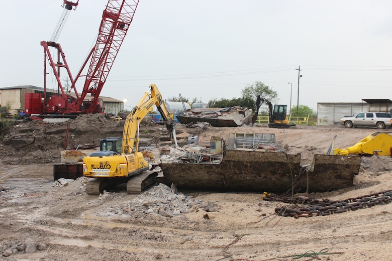 A piece of the STURGIS sits on land after the final water piece of the vessel was removed. After serving in World War II, the STUGIS was converted into the world’s first floating nuclear plant in the 1960’s, housing the MH-1A nuclear reactor.  After being shut down in 1976, the STUGIS’s formal decommissioning effort began in 2012 and was completed in summer of 2018 with the safe removal of all components of the deactivated nuclear reactor and associated radioactive waste that was formerly aboard the STURGIS.