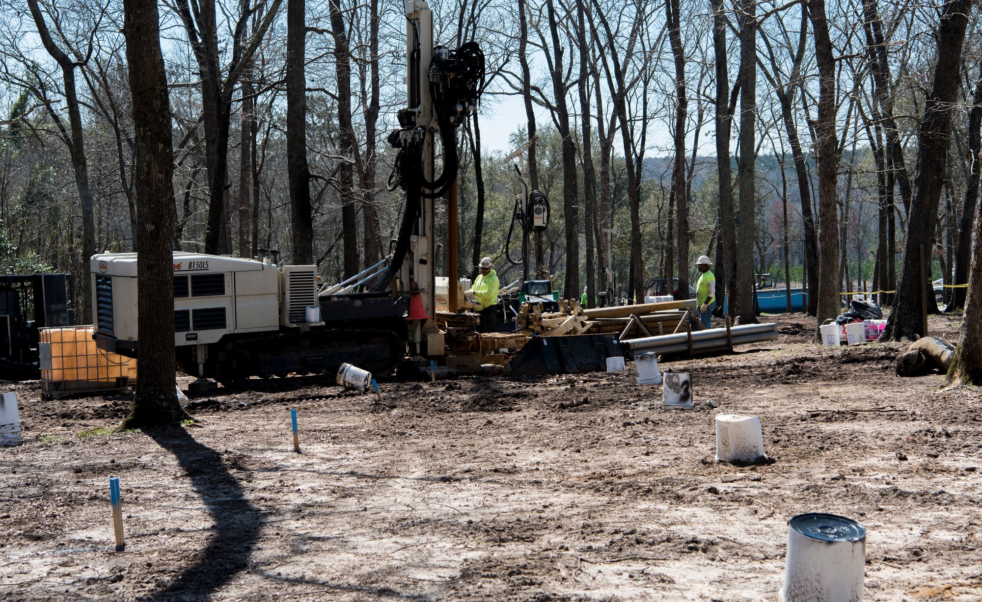 South Atlantic Environmental Drilling and Construction Company workers use a Geoprobe Rotary Sonic drill rig to drill a small diameter pipe into the ground at Sans Souci Farm in Sumter, S.C., March 7, 2019.