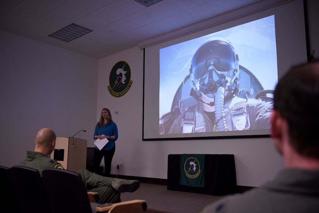 Ashley Schafer speaks to 49th Fighter Training Squadron pilots, March 11, 2019, on Columbus Air Force Base, Mississippi. After the death of her husband, Maj. Richard Schafer, a 49th FTS instructor pilot, in August 2014, she has traveled and spoke to military members and families educating them on how to prepare for the worst. (U.S. Air Force photo by Airman 1st Class Keith Holcomb)