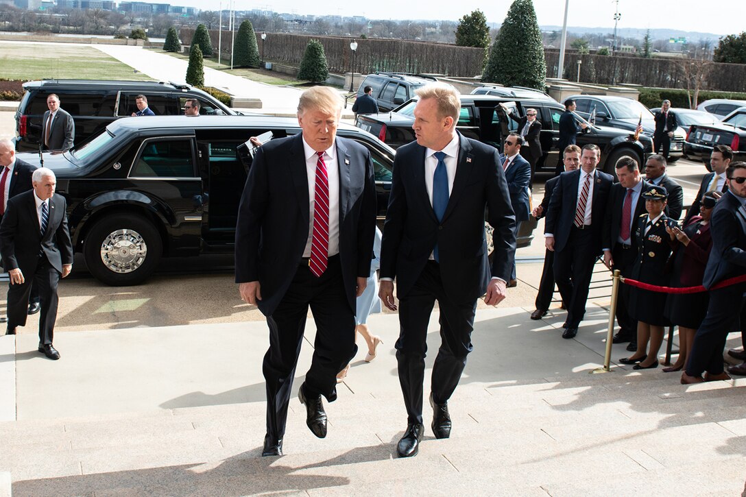 President Donald J. Trump walks up the steps of the Pentagon with Acting Defense Secretary Patrick M. Shanahan.