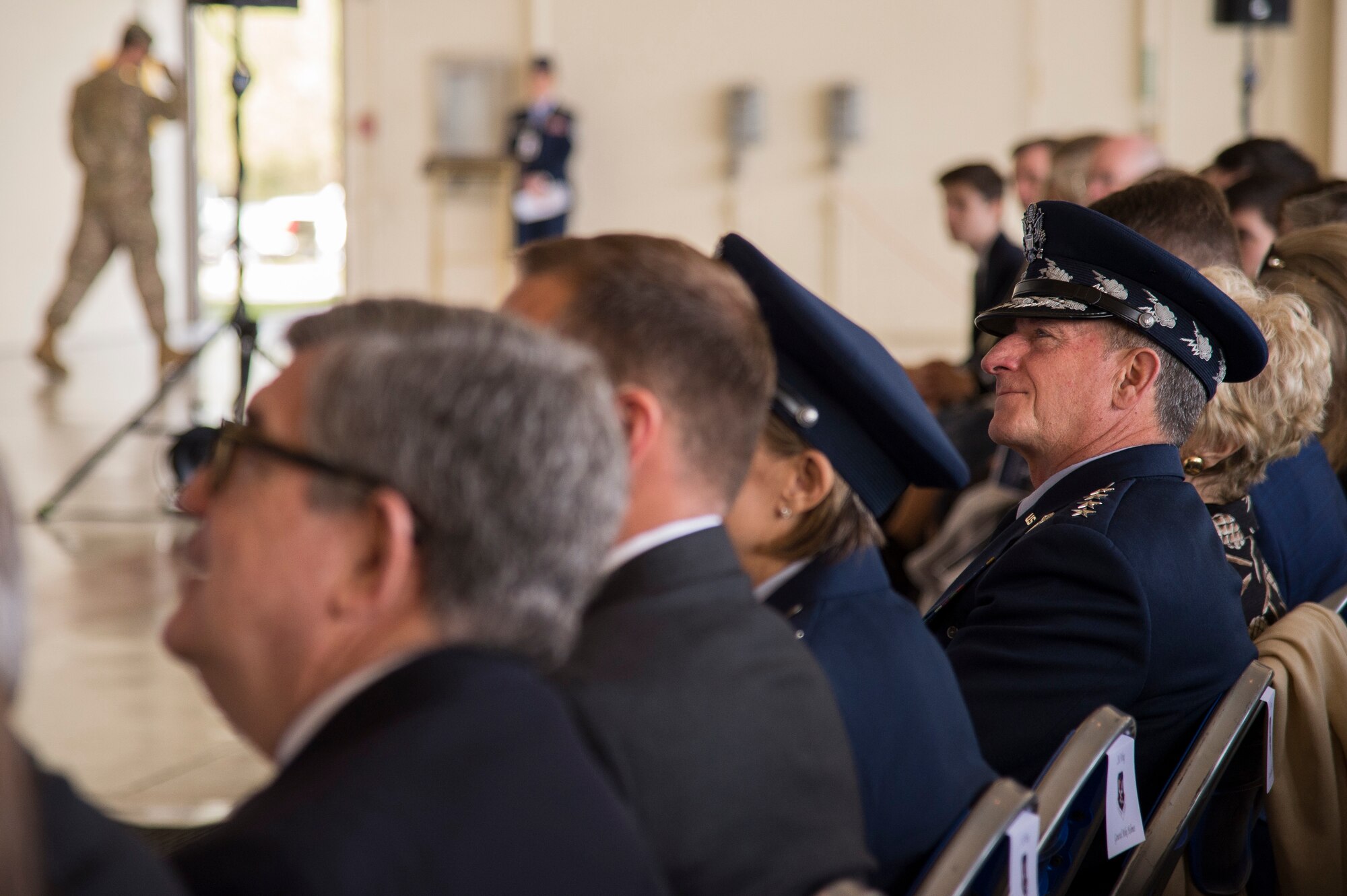 Air Force Chief of Staff Gen. David L. Goldfein listens to remarks during the Celebration of Life ceremony honoring Mr. W. Parker Greene, March 14, 2019, at Moody Air Force Base, Ga. Greene, a steadfast Air Force advocate and one of the most influential military civic leaders passed away Dec. 18, 2018. (U.S. Air Force Photo by Andrea Jenkins)