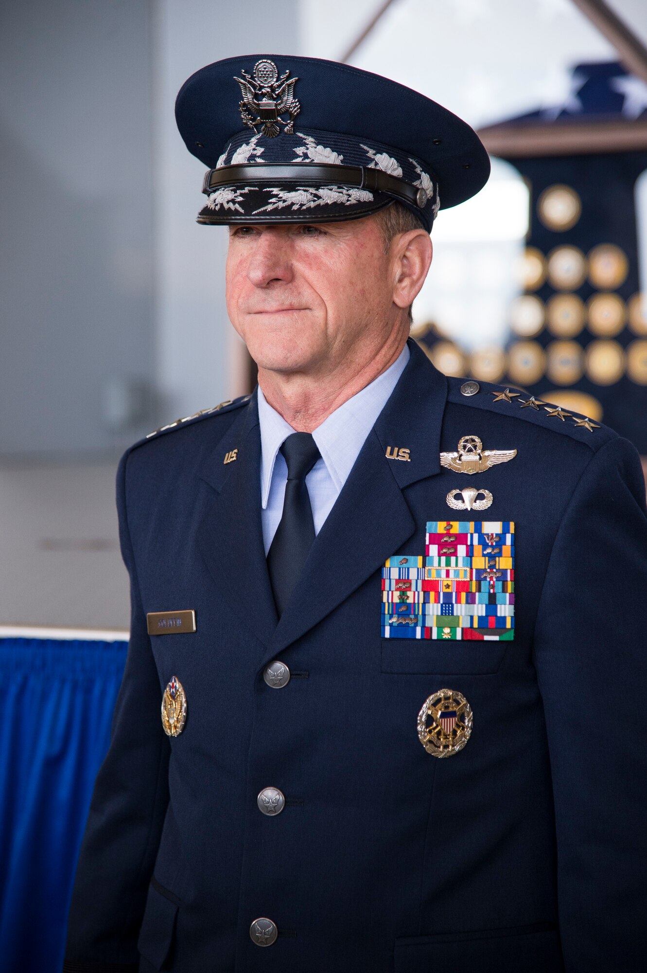 Air Force Chief of Staff Gen. David L. Goldfein stands at attention during the presentation of the Air Force Distinguished Public Service Award (DPSA) for the late Mr. W. Parker Greene during a Celebration of Life ceremony, March 14, 2019, at Moody Air Force Base, Ga. Greene, a steadfast Air Force advocate and one of the most influential military civic leaders passed away Dec. 18, 2018. Greene is the first to ever receive two DPSAs, the highest honor the Air Force can bestow upon a civilian. (U.S. Air Force Photo by Andrea Jenkins)