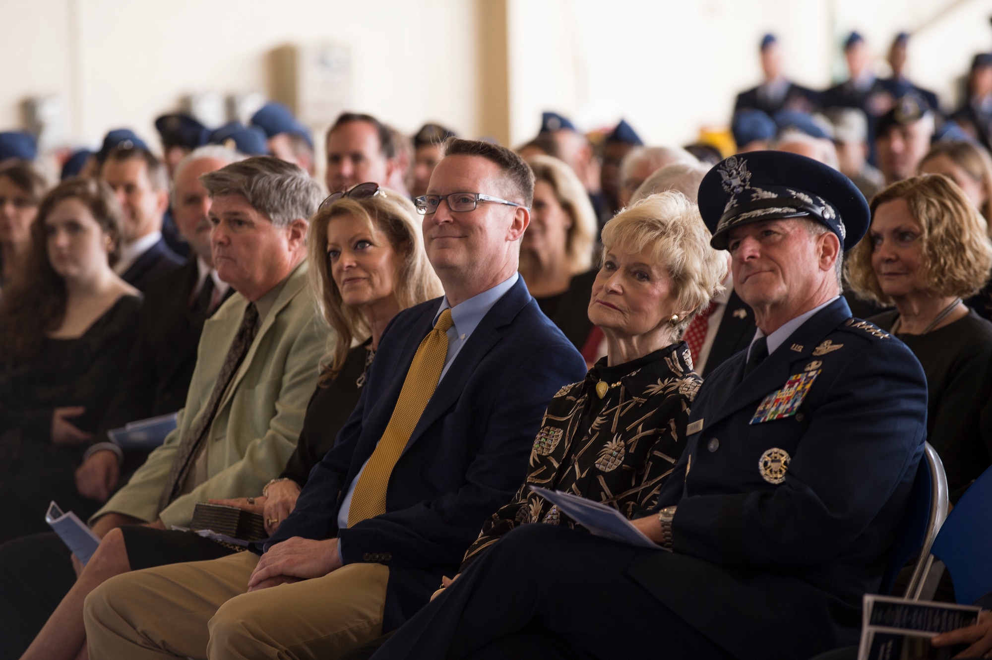 Family of the late Mr. W. Parker Greene and Air Force Chief of Staff Gen. David L. Goldfein, right, listen to remarks during a Celebration of Life ceremony honoring Mr. Greene, March 14, 2019, at Moody Air Force Base, Ga. Greene, a steadfast Air Force advocate and one of the most influential military civic leaders passed away Dec. 18, 2018. (U.S. Air Force Photo by Andrea Jenkins)