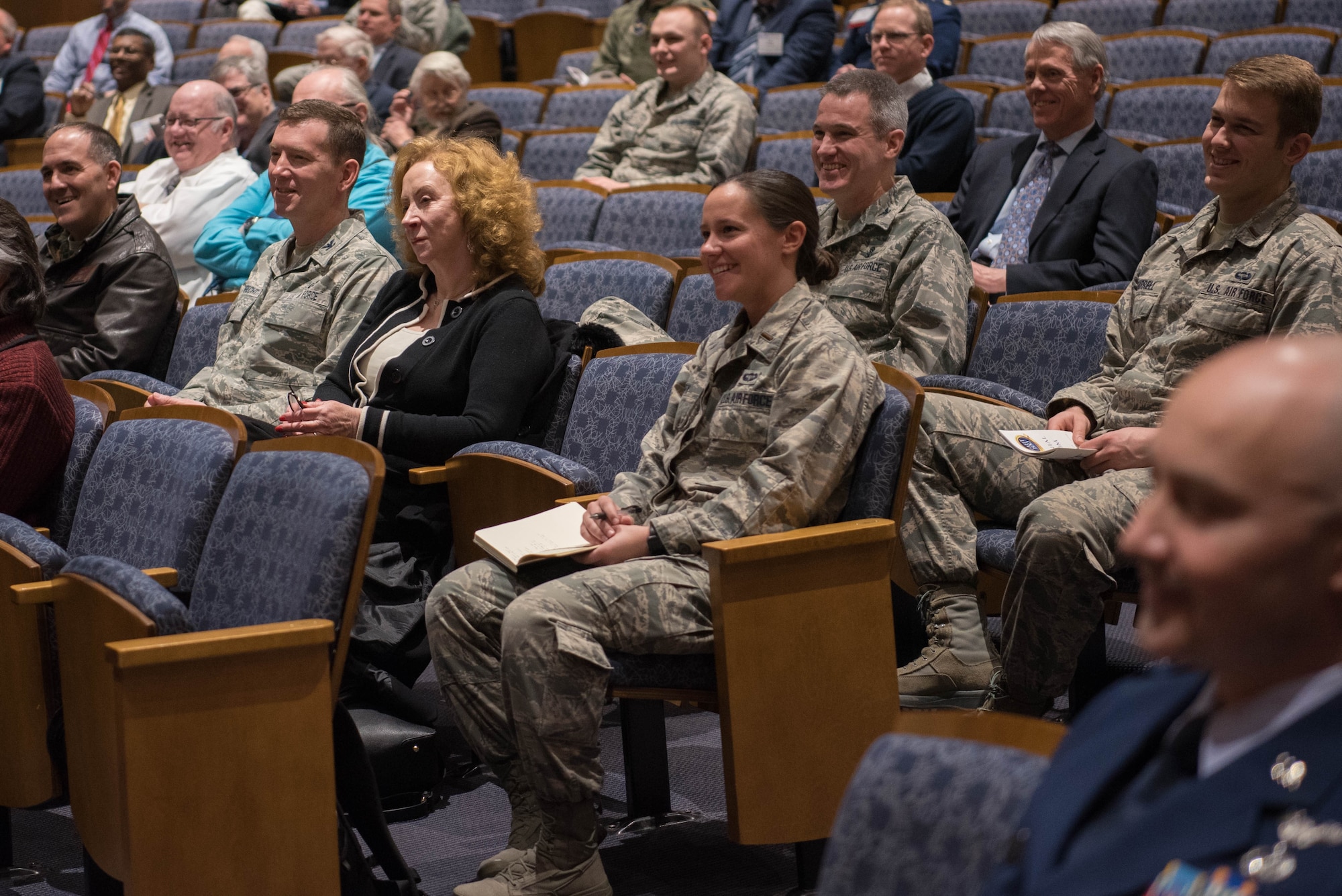 Scientists, researchers and other various guests listen to Air Force Institute of Technology alumni and heads of fields of science during the AFIT Centennial Symposium about the future of the Air Force at the Sinclair Ponitz Conference Center in Dayton, Ohio, Mar. 5, 2019. Attendees had the chance to listen to the Chief Scientist of the Air Force, those who currently work at NASA, and other prominent members of the science community.