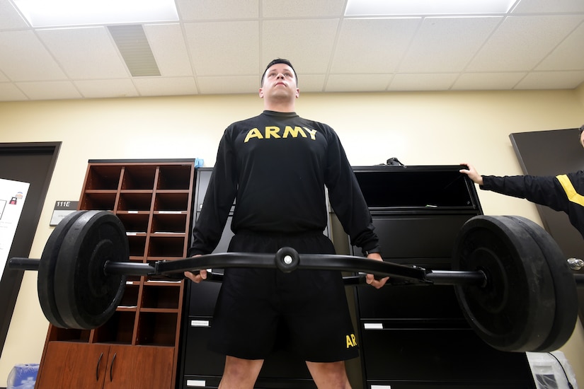Army Reserve Sgt. 1st Class Tim Sierra, Intelligence Analyst, 85th U.S. Army Reserve Support Command, attempts the 3 Repetition Maximum Deadlift event of the Army Combat Fitness Test at the Battalion Commanders Huddle, Mar. 9, 2019.