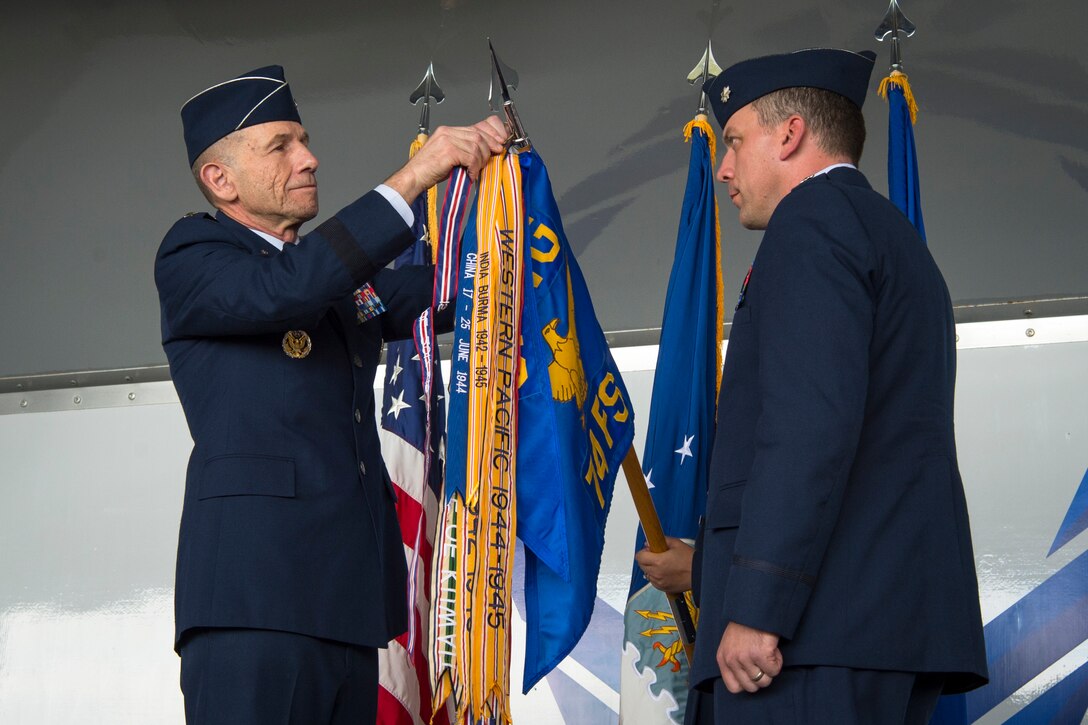 Gen. Mike Holmes, Air Combat Command commander, hangs the Gallant Unit Citation streamer, March 14, 2019, at Moody Air Force Base, Ga. When deployed, the 74th FS becomes the 74th Expeditionary Fighter Squadron (EFS), whose mission is to provide close air support, air interdiction and combat search and rescue to facilitate Operation INHERENT RESOLVE objectives. The 74th EFS distinguished itself by extraordinary heroism while engaged in conflict with an opposing force from July 15, 2017, to Jan. 15, 2018.  During this time, the 74th EFS flew over 1,600 sorties and 10,000 hours in support of the operation, striking nearly 2,500 targets and killing 3,100 Islamic State of Iraq and Syria (ISIS) fighters. Upon the 74th EFS departure, the United States declared ISIS defeated in Syria and Iraq. (U.S. Air Force photo by Airman 1st Class Taryn Butler)
