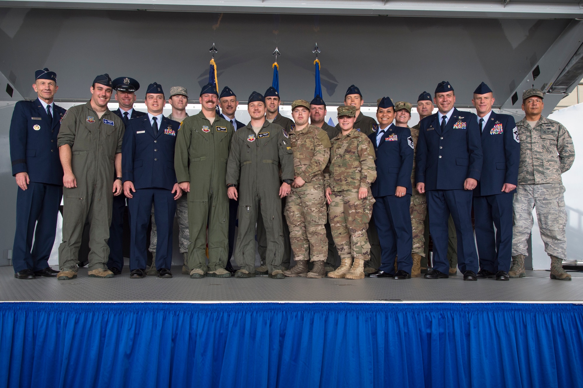 Gen. Mike Holmes, left, Air Combat Command commander, poses with the 74th Fighter Squadron (FS) during the Gallant Unit Citation presentation, March 14, 2019, at Moody Air Force Base, Ga. When deployed, the 74th FS becomes the 74th Expeditionary Fighter Squadron (EFS) which distinguished itself by extraordinary heroism while supporting Operation INHERENT RESOLVE and engaging with an opposing force from July 15, 2017, to Jan. 15, 2018. The individual combat actions help to demonstrate the exceptional degree of professionalism, dedication to duty, gallantry and heroism that separates the 74th EFS from other fighter units. Five Distinguished Flying Crosses, seven Single Event Air Medals and 83 Air Medals with “Combat” Device were awarded to squadron members. The 83 “Combat” devices represent that nearly 100 percent of 1,600 sorties were flown under significant risk to self. The unmatched ability of 74th EFS pilots prevented a strategically catastrophic aircraft loss and prevented countless civilian and friendly deaths without degradation to their primary mission, ultimately leading to the decisive defeat of ISIS in Iraq and Syria. (U.S. Air Force photo by Airman 1st Class Taryn Butler)