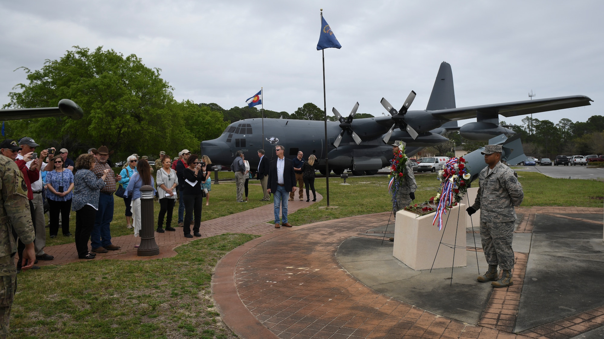 People walking up to wreath memorial in airpark