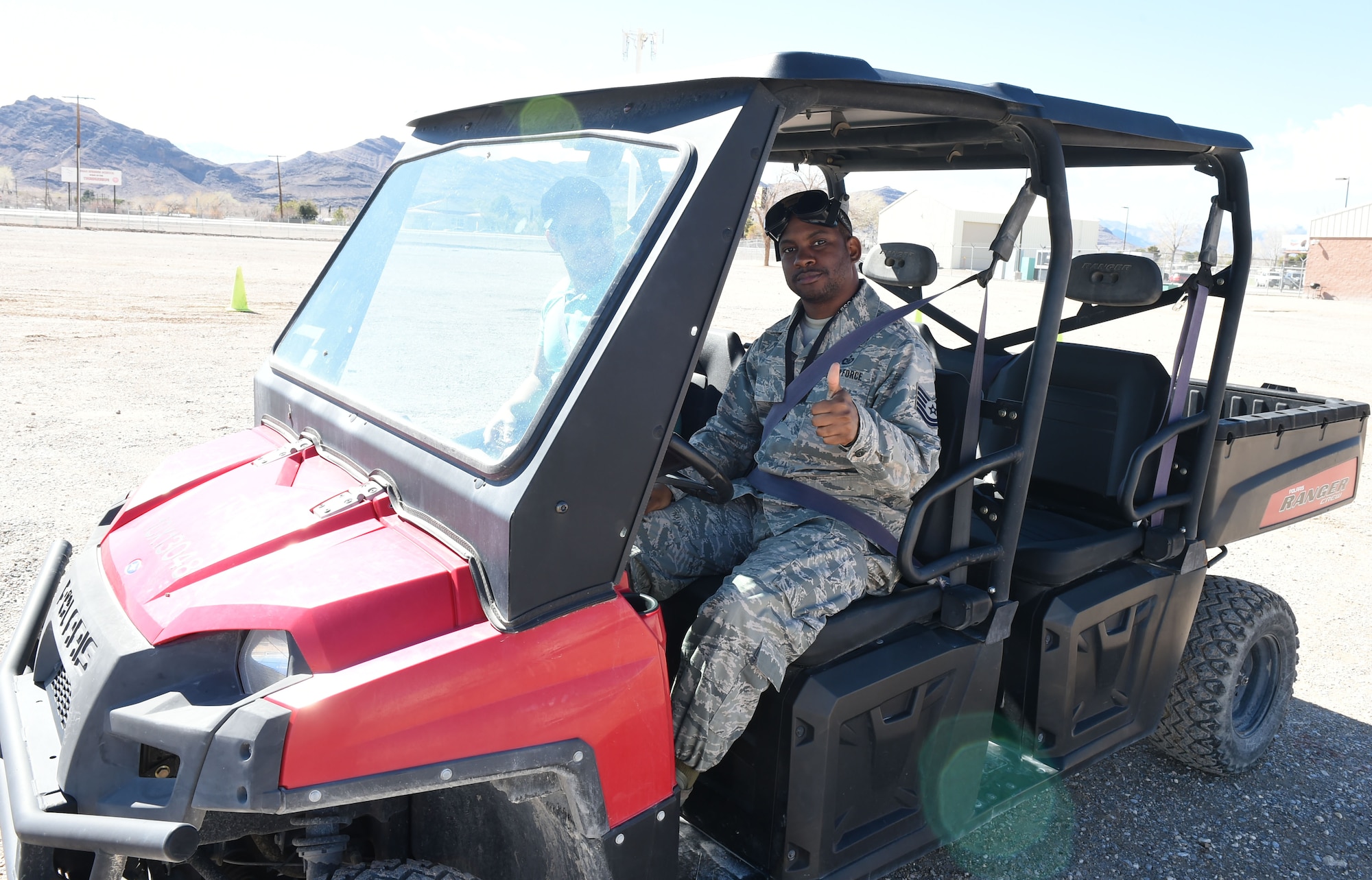 Tech. Sgt. Caprice, 867th Attack Squadron flight chief, prepares to attempt a slalom course while wearing impairment simulating goggles on a closed course during Creech Air Force Base’s second annual anti-drug town hall and DUI awareness course March 7, 2019. Representatives from supporting agencies across base converged to educate Creech Airmen about updated U.S. Air Force drug policies, and the dangers of driving while impaired. (U.S. Air Force photo by Tech. Sgt. Dillon White)