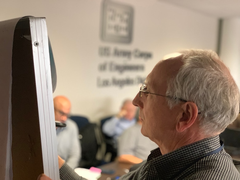 U.S. Army Corps of Engineers Los Angeles District Chief of Emergency Management Branch David Kingston conducts an after action review after a continuity of operations exercise conducted in Phoenix, Arizona on March 11.