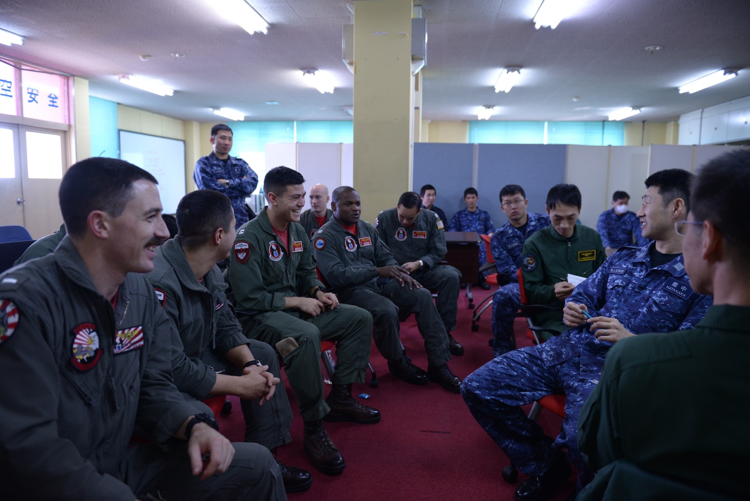 ATSUGI, Japan (Mar. 14, 2019) — Sailors assigned to the "War Eagles" of Patrol Squadron (VP) 16 meet with the Japan Maritime Self-Defense Force (JMSDF) Sailors assigned to (VP) 3. VP-16 took part in a Trilateral Anti-Submarine Warfare Exercise which included Royal Navy, JMSDF and U.S. assets.