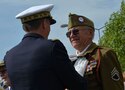 George K. Mullins, a D-Day Veteran who participated in the liberation of Carentan, receives a medal during the Chevalier Legion of Honour during the Carre de Choux (Cabbage Patch) Ceremony in Carentan, France