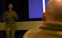 Col. Joseph Meyer, 375th Air Mobility Wing commander, speaks during the motorcycle riding preseason brief at Scott Air Force Base, Ill., March 12, 2019. The briefing was focused on proper motorcycle riding techniques in various different conditions that may occur within the Illinois area. (U.S. Air Force photo by Airman 1st Class Solomon Cook)