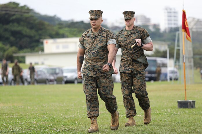 Sgt. Maj. Jose A. Beltran, left, and Sgt. Maj. Jeffery J. Vandentop, right, march during a relief and appointment ceremony for 3rd Transportation Support Battalion, Combat Logistics Regiment 3, 3rd Marine Logistics Group at Camp Foster, Okinawa, Japan March 15, 2019.  Vandentop ceremoniously transferred accountability and authority of enlisted Marines to Beltran during the ceremony. Vandentop is a native of Toronto, Canada. Beltran, the battalion sergeant major for 3rd TSB, is a native of Puerto Rico. (U.S. Marine Corps photo by Lance Cpl. Armando Elizalde)