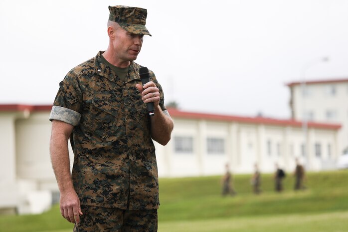 Lt. Col. Matthew Mulvey greets Marines and family members during a relief and appointment ceremony for 3rd Transportation Support Battalion, Combat Logistics Regiment 3, 3rd Marine Logistics Group at Camp Foster, Okinawa, Japan March 15, 2019. Sgt. Maj. Jeffery J. Vandentop ceremoniously transferred accountability and authority of enlisted Marines to Sgt. Maj. Jose A. Beltran during the ceremony. Mulvey, the commanding officer of 3rd TSB, CLR-3, 3rd MLG, is a native of Cherryville, North Carolina. (U.S. Marine Corps photo by Lance Cpl. Armando Elizalde)