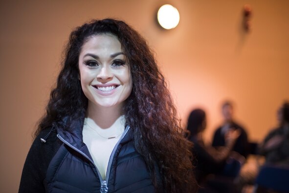 U.S. Air Force Airman 1st Class Elizabeth Williams, a 35th Medical Operations Squadron aerospace medical technician, pauses for a photo during a Misawa First Four meeting at Misawa Air Base, Japan, Feb. 22, 2019. As vice president, Williams demonstrates her leadership and organizational skills. (U.S. Air Force photo by Airman 1st Class Collette Brooks)