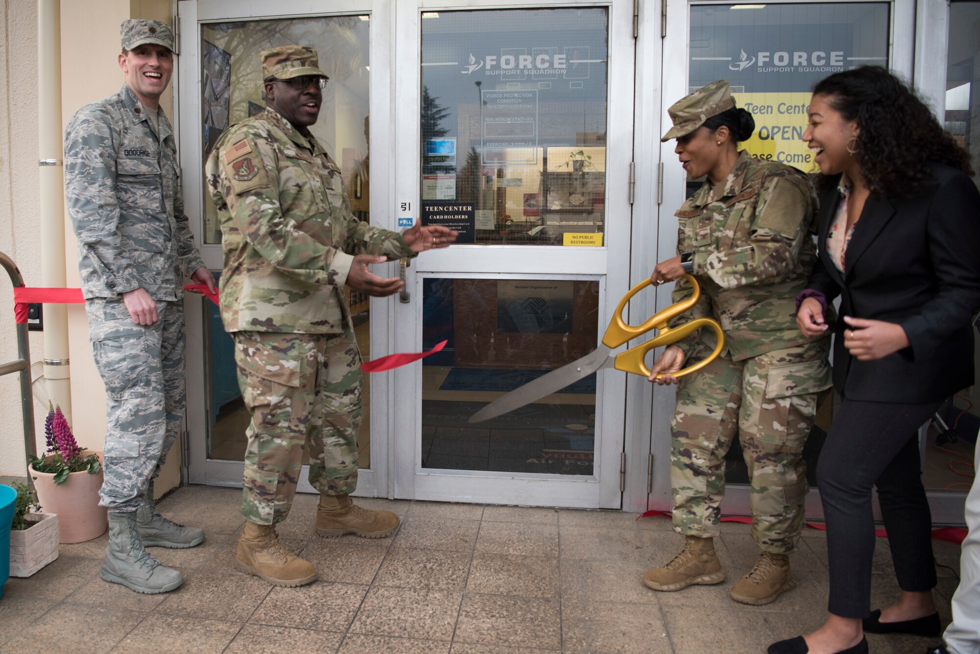 Yokota leadership cut the ribbon during the reopening of the Teen Center, Mar. 15, 2019, at Yokota Air Base, Japan