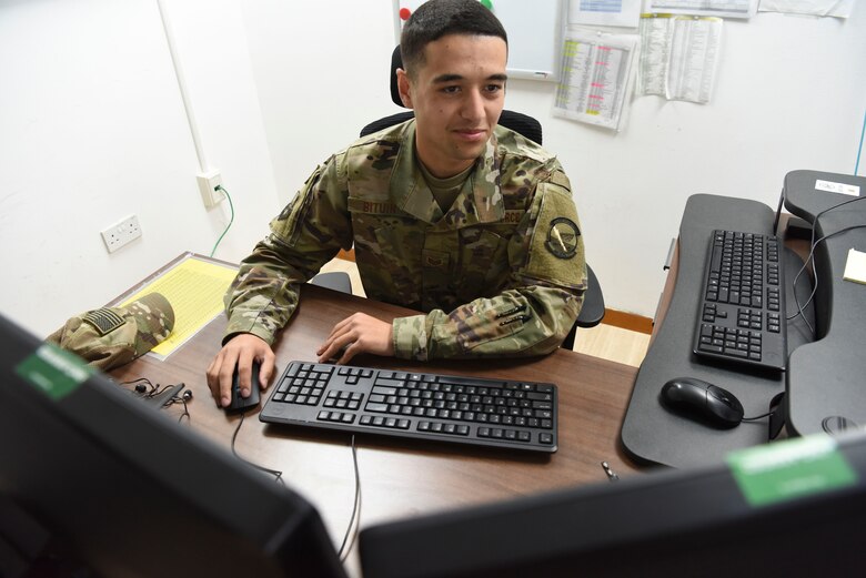 Staff Sgt. Adrian Bituin, 380th Expeditionary Logistics Readiness Squadron logistics plans journeyman, tracks the movements of deployers at Al Dhafra Air Base, United Arab Emirates, Mar. 14, 2019.