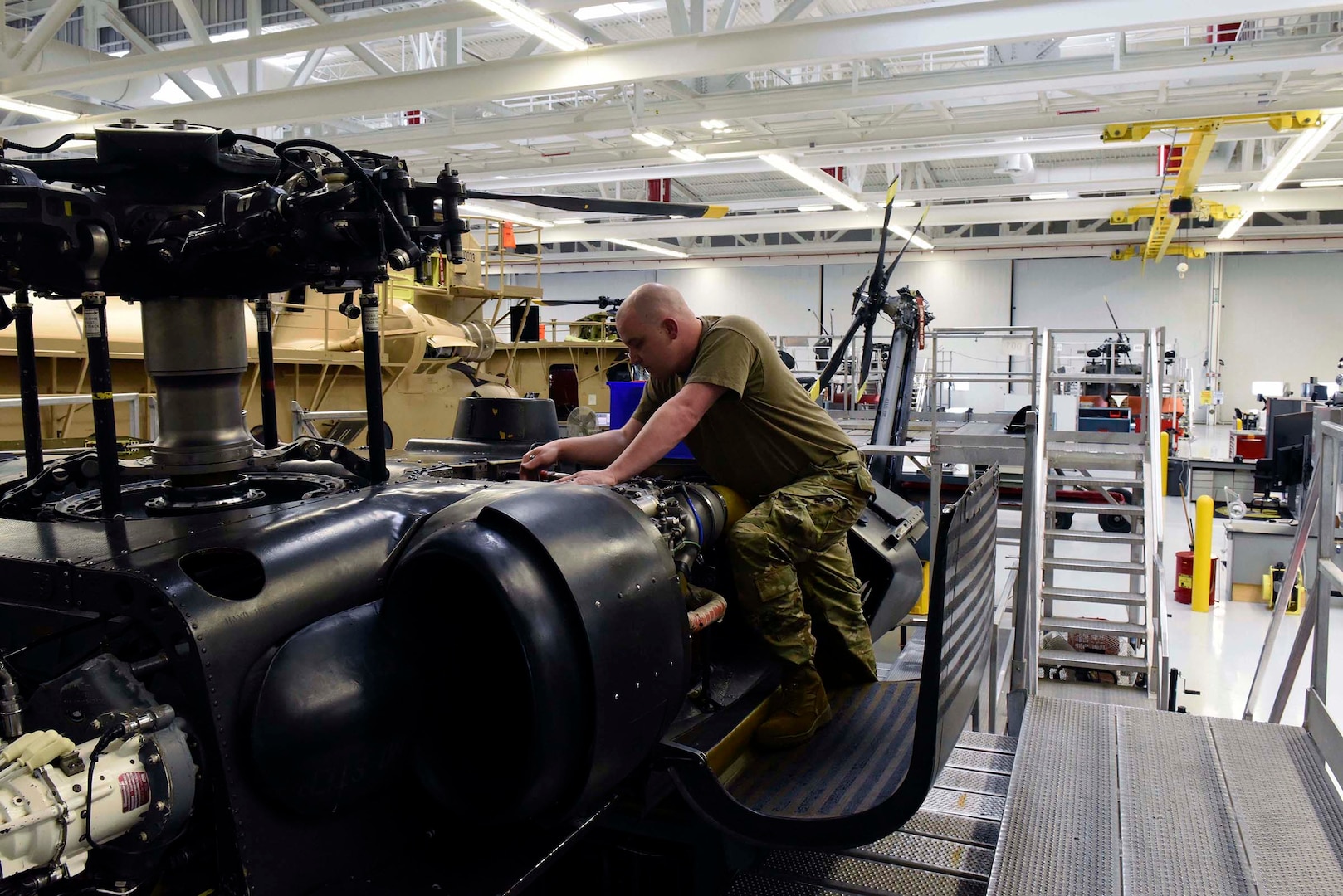 Army Sgt. Daniel Bryd, with the Tennessee Army National Guard's 1st Battalion (Air Assault), 230th Aviation Regiment, replaces an engine starter on a hardware maintenance trainer as part of a reclassification course at the Eastern Army National Guard Aviation Training Site in Fort Indiantown Gap, Pennsylvania, Feb. 27, 2019. The trainer is a non-flyable air frame that gives students hands-on experience with maintenance and repair procedures.