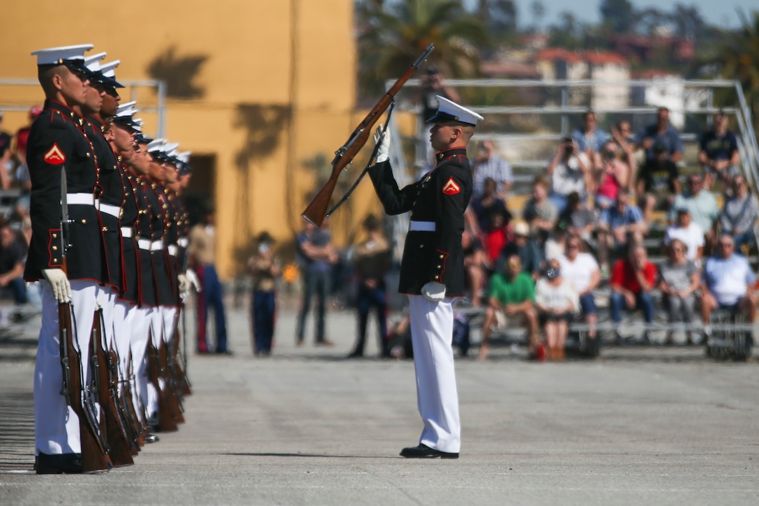 The U.S. Marine Corps Silent Drill Platoon, Marine Barracks Washington, D.C., perform during the Battle Color Ceremony at Marine Corps Recruit Depot San Diego, March 16.