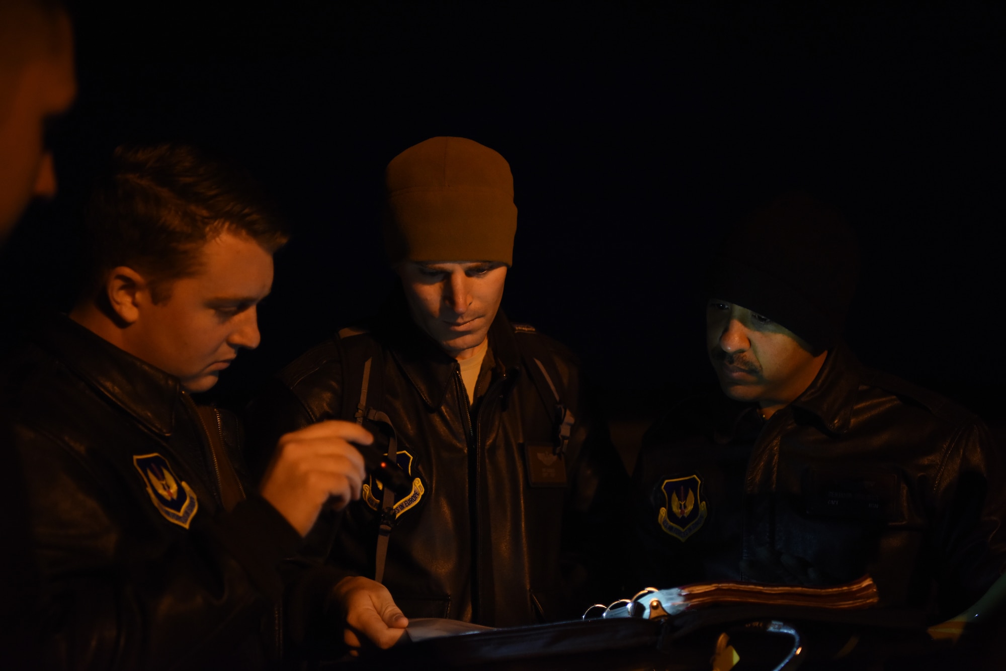A KC-135 Stratotanker crew reviews pre-flight checklists at RAF Mildenhall, England, March 11, 2019. The crew was involved in training with Romanian air force F-16s over the skies of Romania which enhanced regional capabilities to secure air sovereignty and promote peace and security through cooperation, collaboration, interoperability with NATO partners and other allies in the region. (U.S. Air Force photo by Airman 1st Class Brandon Esau)