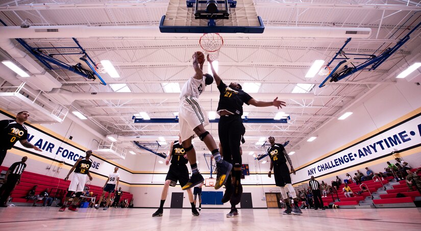 A U.S. Airman assigned to the 20th Equipment Maintenance Squadron aerospace ground equipment flight attempts a lay-up during an intramural basketball championship game at Shaw Air Force Base, S.C., March 14, 2019.