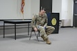 Staff Sgt. William Jacobson, a small group leader instructor/writer and combat medic advanced leader course coordinator of the 5th Brigade (Health Services), 94th Training Division-Force Sustainment, demonstrates how to apply a leg tourniquet during the 80th Training Command (TASS) Instructor of the Year Competition at Fort Knox, Kentucky, October 18-21, 2018. The competition was held at the installation’s Boudinot Hall where Jacobson outperformed 20 competitors to claim the title as the 2018 80th TC IOY. (Photo by Sgt. 1st Class Elizabeth Breckenkamp)