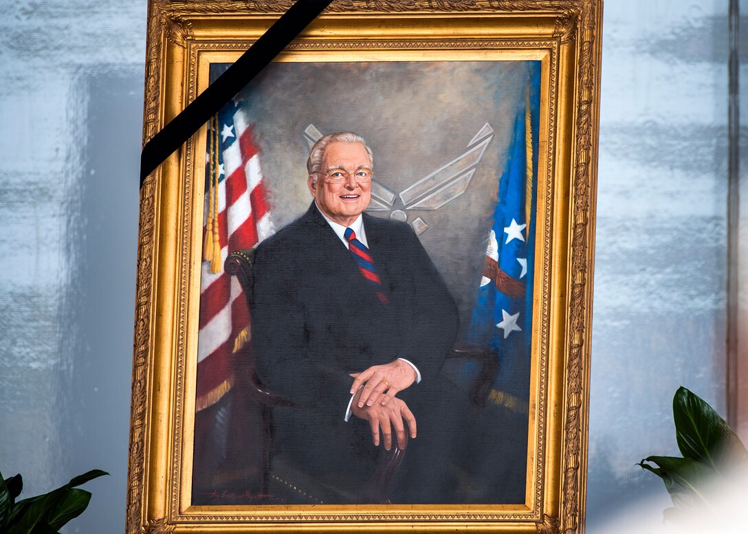 A portrait of the late W. Parker Greene rests on a stage at the Celebration of Life ceremony honoring Mr. Greene, March 14, 2019, at Moody Air Force Base, Ga. The event was held in honor of Mr. Greene and his unwavering support to Moody, the local community and the entire Air Force for more than 40 years. Mr. Greene, a steadfast Air Force advocate and one of the most influential military civic leaders, passed away Dec. 18, 2018. (U.S. Air Force photo by Airman 1st Class Eugene Oliver)