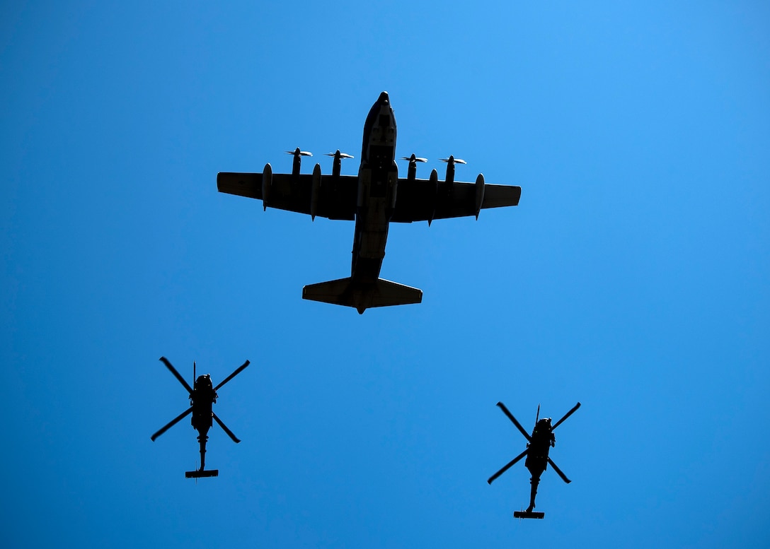 Aircraft fly in formation during a Celebration of Life ceremony honoring the late W. Parker Greene, March 14, 2019, at Moody Air Force Base, Ga. Mr. Greene was an Air Force advocate who was the patriarch of the relationship between Moody and the local community. He was also instrumental in keeping Moody active after it was identified for possible closure in 1991. His continued dedication to the installation resulted in him receiving the highest Air Force civilian honor, the Air Force Distinguished Public Service Award, twice. Mr. Greene, a steadfast Air Force advocate and one of the most influential military civic leaders, passed away Dec. 18, 2018. (U.S. Air Force photo by Airman 1st Class Eugene Oliver)