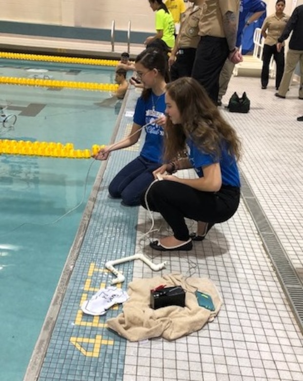Students learn teamwork skills by working together to design and build an underwater robot as part of the 7th Annual NJ Regional SeaPerch competition at Rowan University in Glassboro, New Jersey March 9. (U.S. Navy photo)