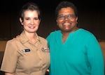Navy Capt. Michele A. Kane, executive officer, Naval Medical Research Unit San Antonio, poses for a photo with retired Command Master Chief Octavia Harris during the Joint Base San Antonio-Fort Sam Houston Women’s History Month observance March 13.