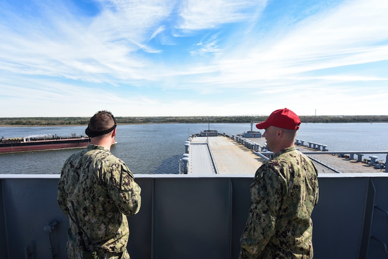 Master-at-Arms 2nd Class Benjamin Goga, left, Coastal Riverine Squadron 10 Bravo, and Master-at-Arms Chief Petty Officer Mark Puckett, right, Coastal Riverine Squadron 10 Bravo 2nd Platoon, observe advanced battle drills during an exercise March 12, 2019, at Joint Base Charleston, S.C. – Naval Weapons Station.