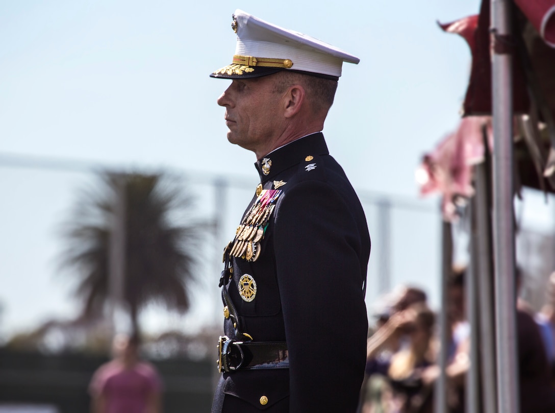 Maj. Gen. Kevin M. Iiams, commanding general of Third Marine Aircraft Wing, stands at attention for colors during the 2019 Battle Color Ceremony at Marine Corps Air Station Miramar, Calif., Mar. 15. The ceremony is held to honor Marine Corps traditions through performances by “The Commandant’s Own”, the Silent Drill Platoon and the Battle Colors Detachment as a whole. (U.S. Marine Corps photo by Cpl. Becky Cleveland)